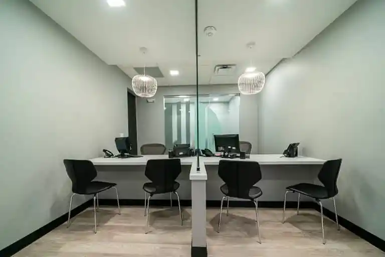 behind front desk